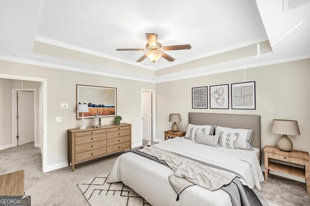 empty room with crown molding, ceiling fan, and light hardwood / wood-style flooring