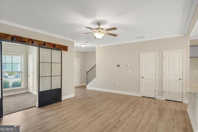 kitchen with gray cabinets, dishwasher, sink, and light stone countertops