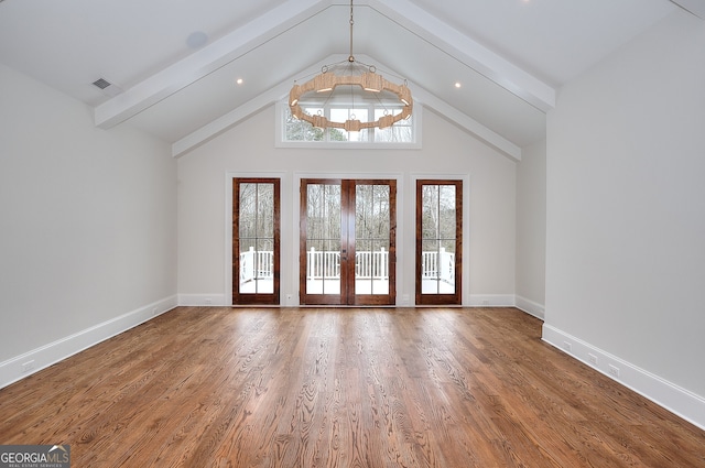 interior space featuring hardwood / wood-style floors, plenty of natural light, and french doors