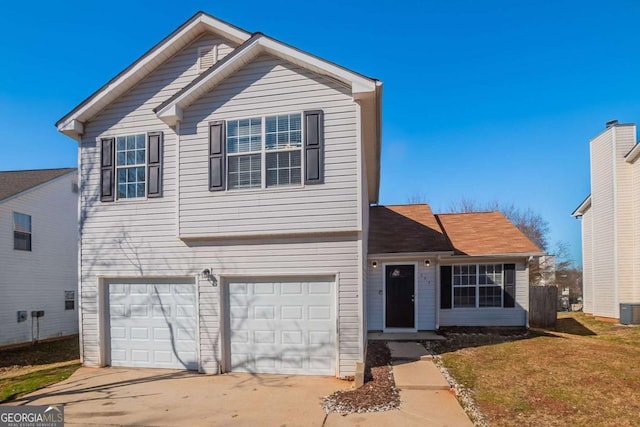 view of front property with a garage, a front yard, and central air condition unit