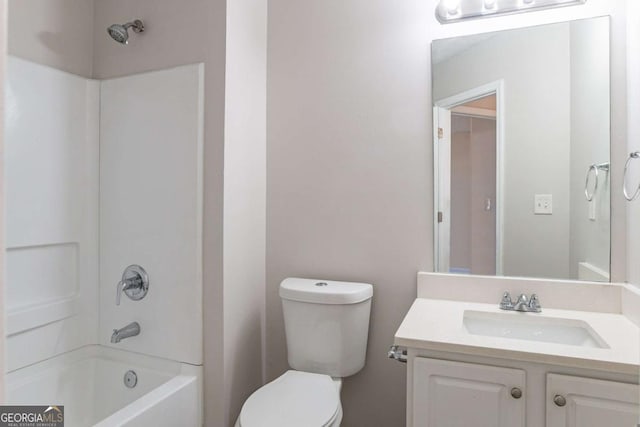 full bathroom with vanity, shower / tub combination, and toilet