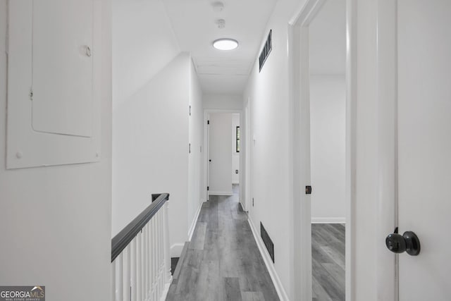 hall featuring wood-type flooring