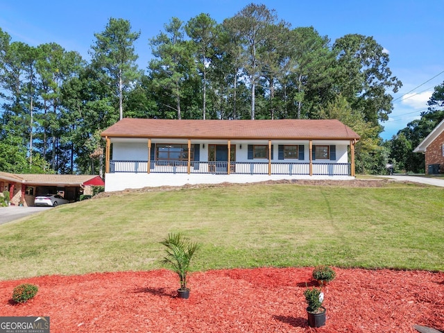 view of front facade with covered porch and a front lawn