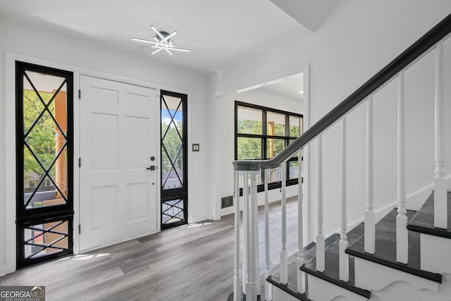 foyer with light wood-type flooring