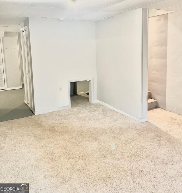 unfurnished room with carpet floors