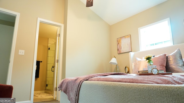 bedroom featuring vaulted ceiling