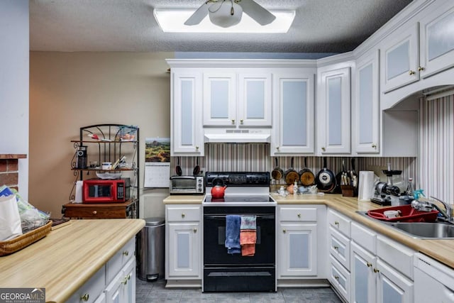 kitchen with sink, white cabinetry, electric range, dishwasher, and ceiling fan