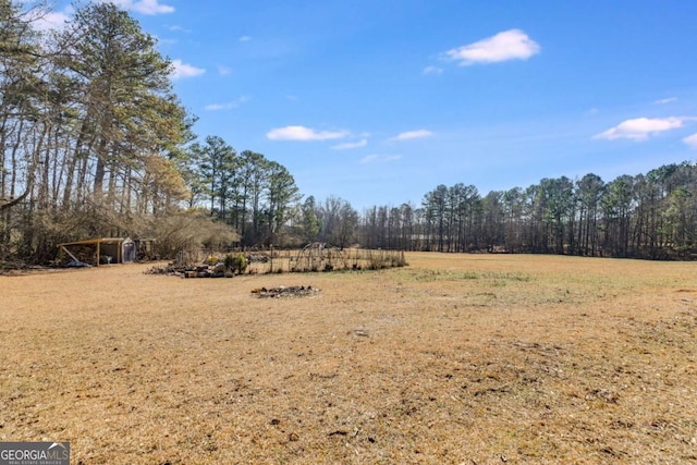 view of yard featuring a rural view