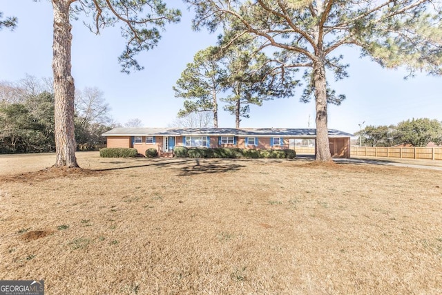 view of front of home with a front yard