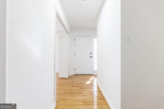 corridor featuring light wood-type flooring