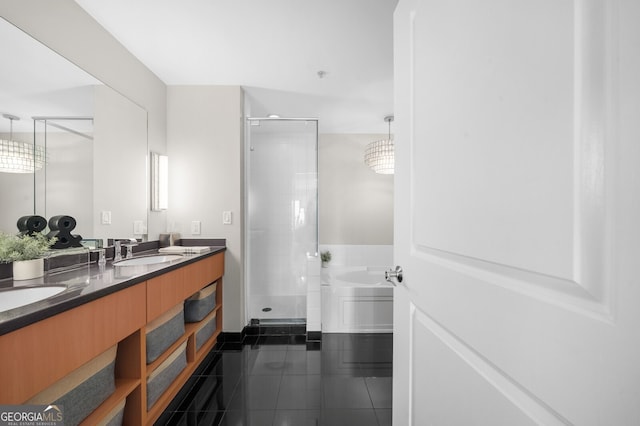 bathroom featuring vanity, separate shower and tub, and tile patterned flooring