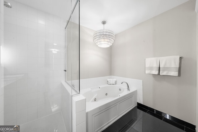 bathroom featuring plus walk in shower and tile patterned floors