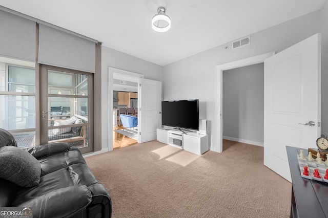 living room with light colored carpet