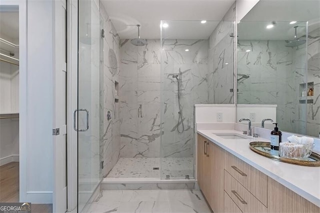 bathroom featuring vanity and walk in shower