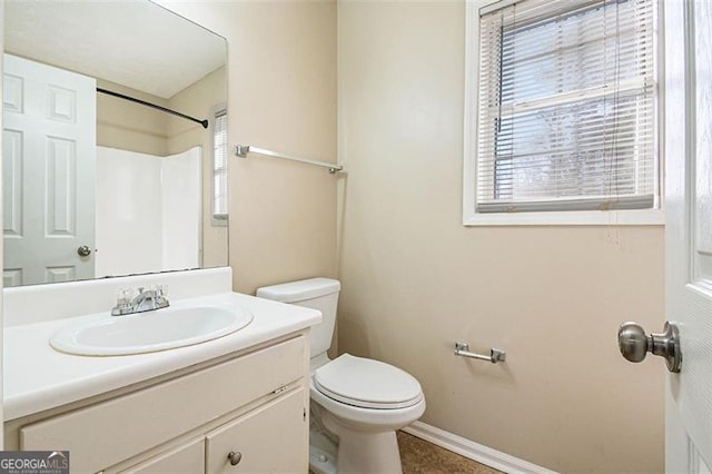 bathroom with vanity and toilet