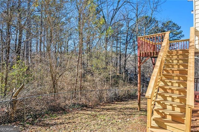 view of yard with a wooden deck