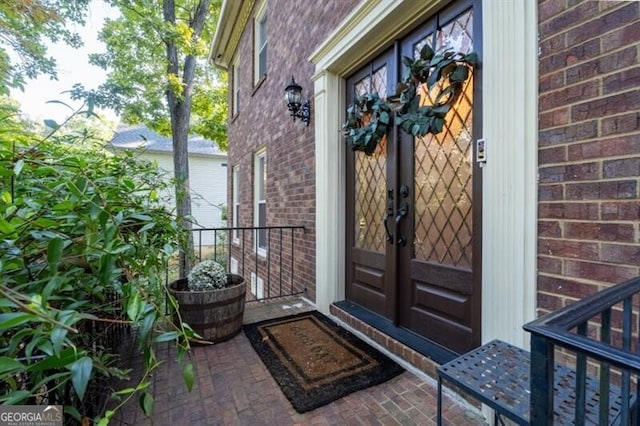 entrance to property featuring french doors