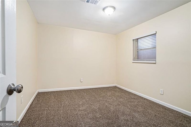 spare room with carpet floors