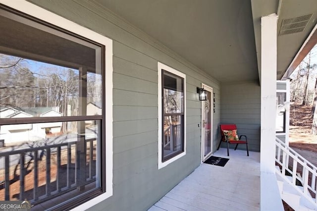 balcony featuring covered porch