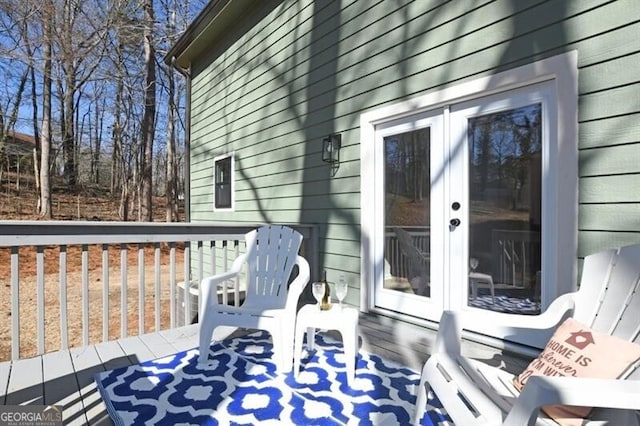 wooden terrace featuring french doors