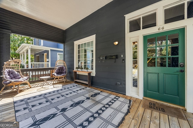 wooden deck with covered porch