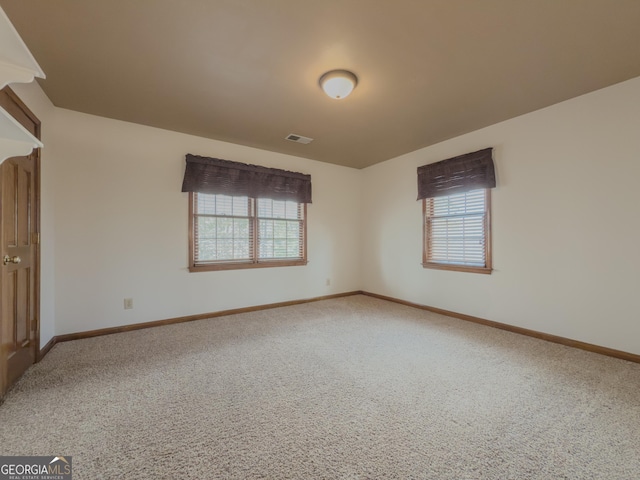 view of carpeted spare room