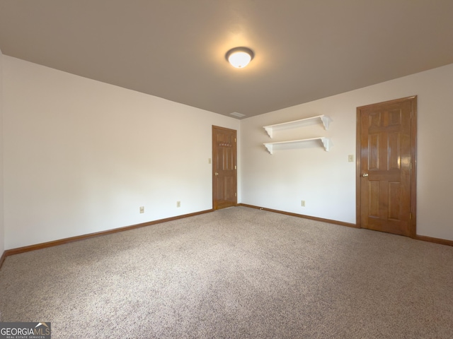 unfurnished bedroom with carpet flooring