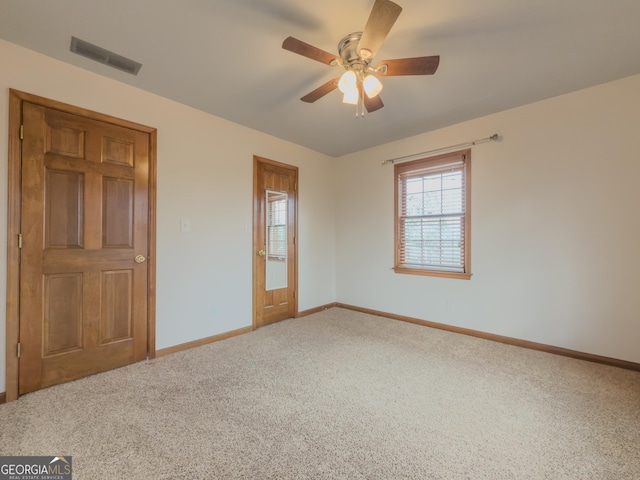 unfurnished bedroom featuring carpet flooring and ceiling fan