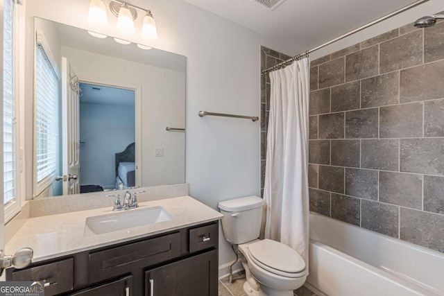 full bathroom with vanity, tile patterned flooring, shower / bath combination with curtain, and toilet