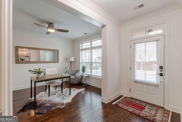 entryway featuring dark wood-type flooring, ornamental molding, and ceiling fan