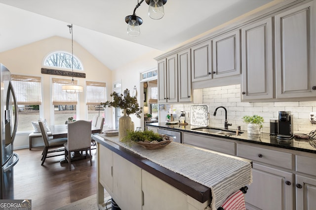 kitchen featuring gray cabinets, sink, dark hardwood / wood-style flooring, and stainless steel appliances