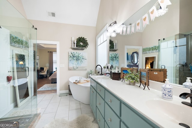 bathroom with high vaulted ceiling, vanity, shower with separate bathtub, and tile patterned flooring