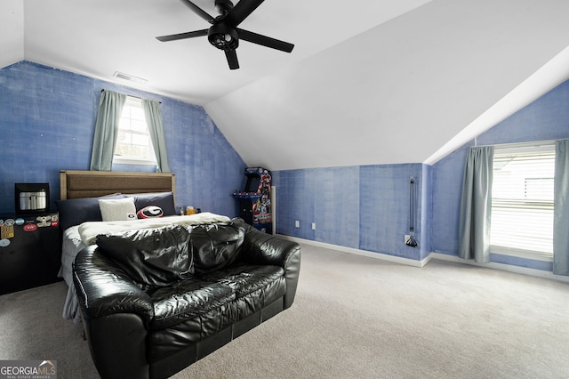 bedroom featuring ceiling fan, lofted ceiling, and carpet