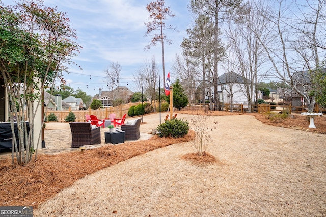 view of yard featuring a patio and an outdoor hangout area