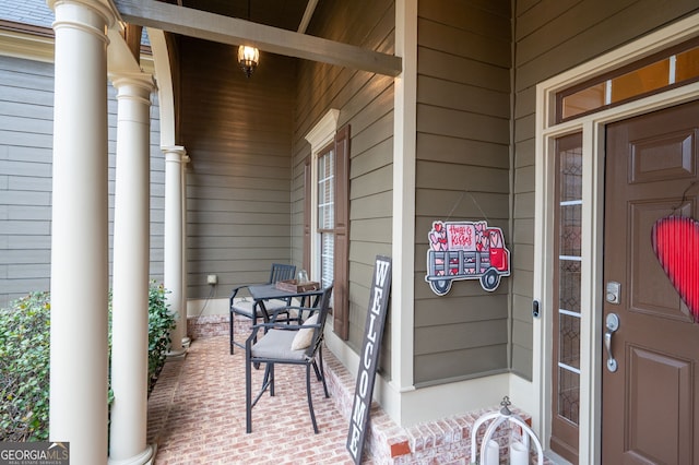 doorway to property featuring a porch