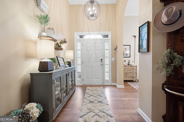 foyer entrance featuring dark hardwood / wood-style floors