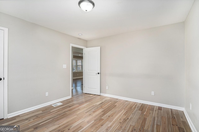 empty room featuring light wood-type flooring