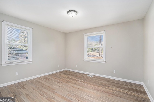 empty room featuring light hardwood / wood-style floors