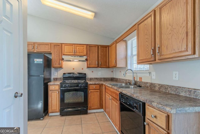 kitchen with light tile patterned flooring, sink, vaulted ceiling, decorative backsplash, and black appliances