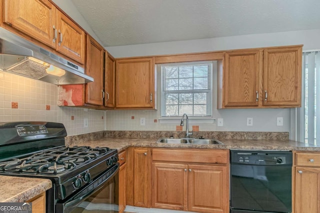 kitchen with a textured ceiling, sink, decorative backsplash, and black appliances