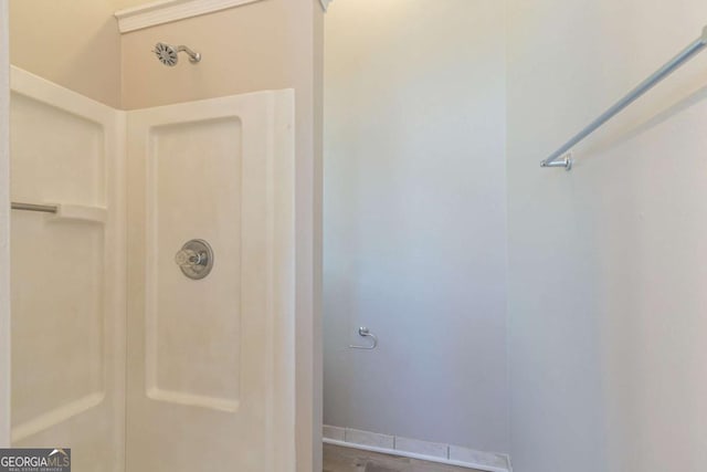 bathroom featuring walk in shower