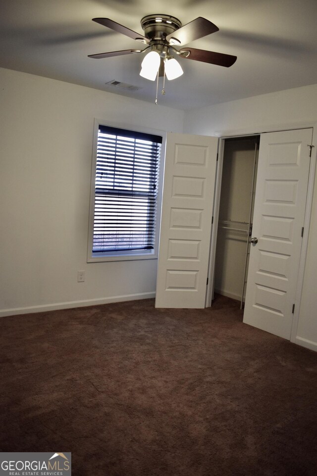 full bathroom with hardwood / wood-style flooring, shower / bathtub combination, vanity, and toilet