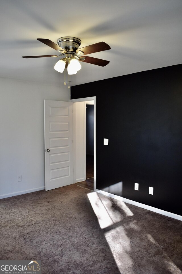 empty room with carpet flooring