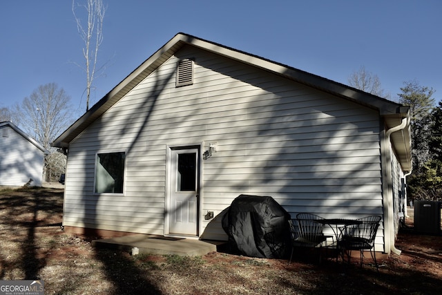 back of house with a patio area