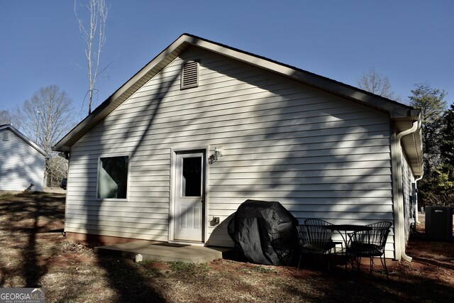 back of house with a patio area