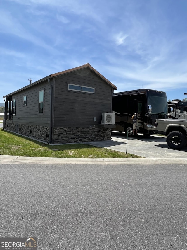 view of property exterior with a carport