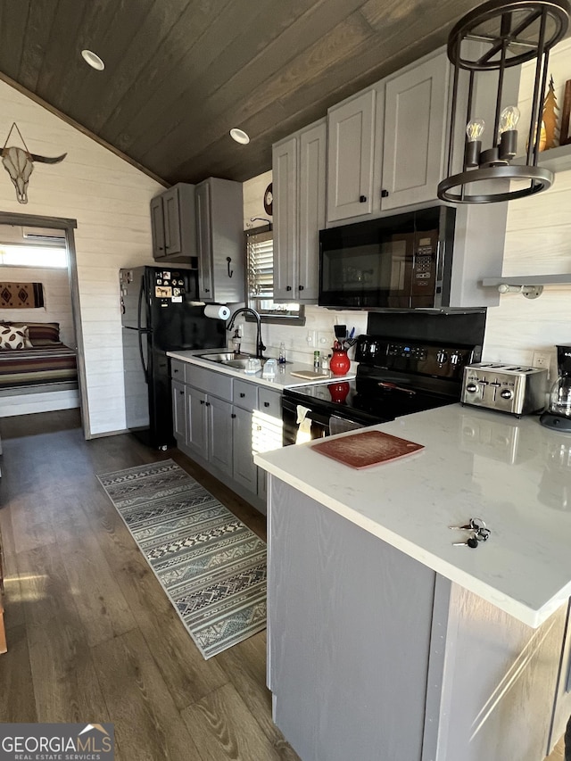 kitchen with lofted ceiling, sink, wooden ceiling, gray cabinets, and black appliances