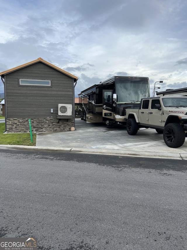 view of property exterior with ac unit