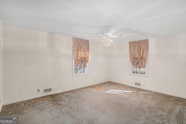 unfurnished room with carpet floors and ceiling fan