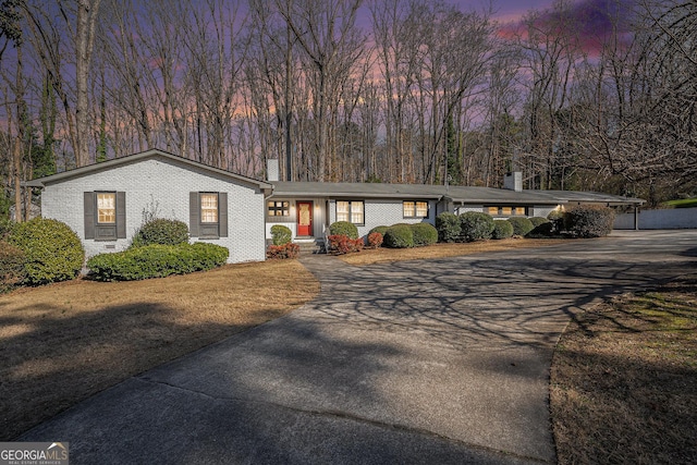 view of front of house featuring a carport